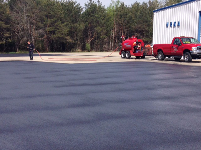 Asphalt Sealcoating for Parking Lots sealcoating asphalt parking lots commercial sealcoating manistee michigan