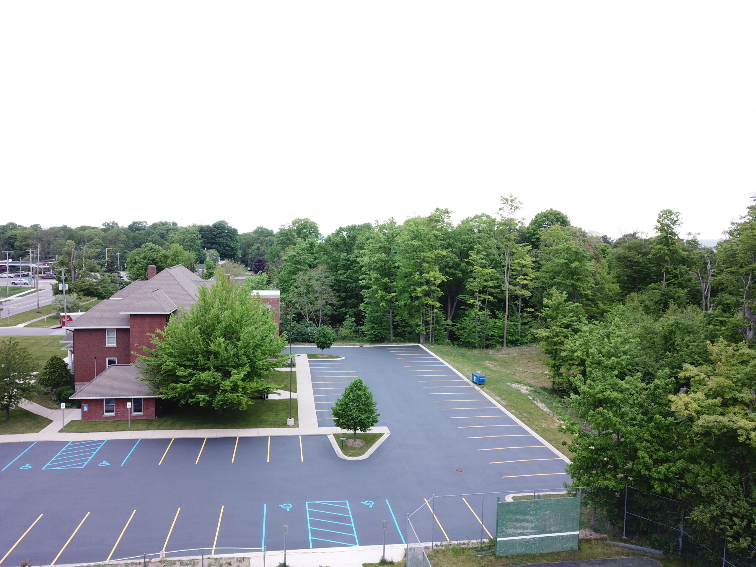 New Sealcoating and Striping in Parking Lots parking lot blacktop seal coating and striping services by brian's superior sealcoating in Manistee County michigan